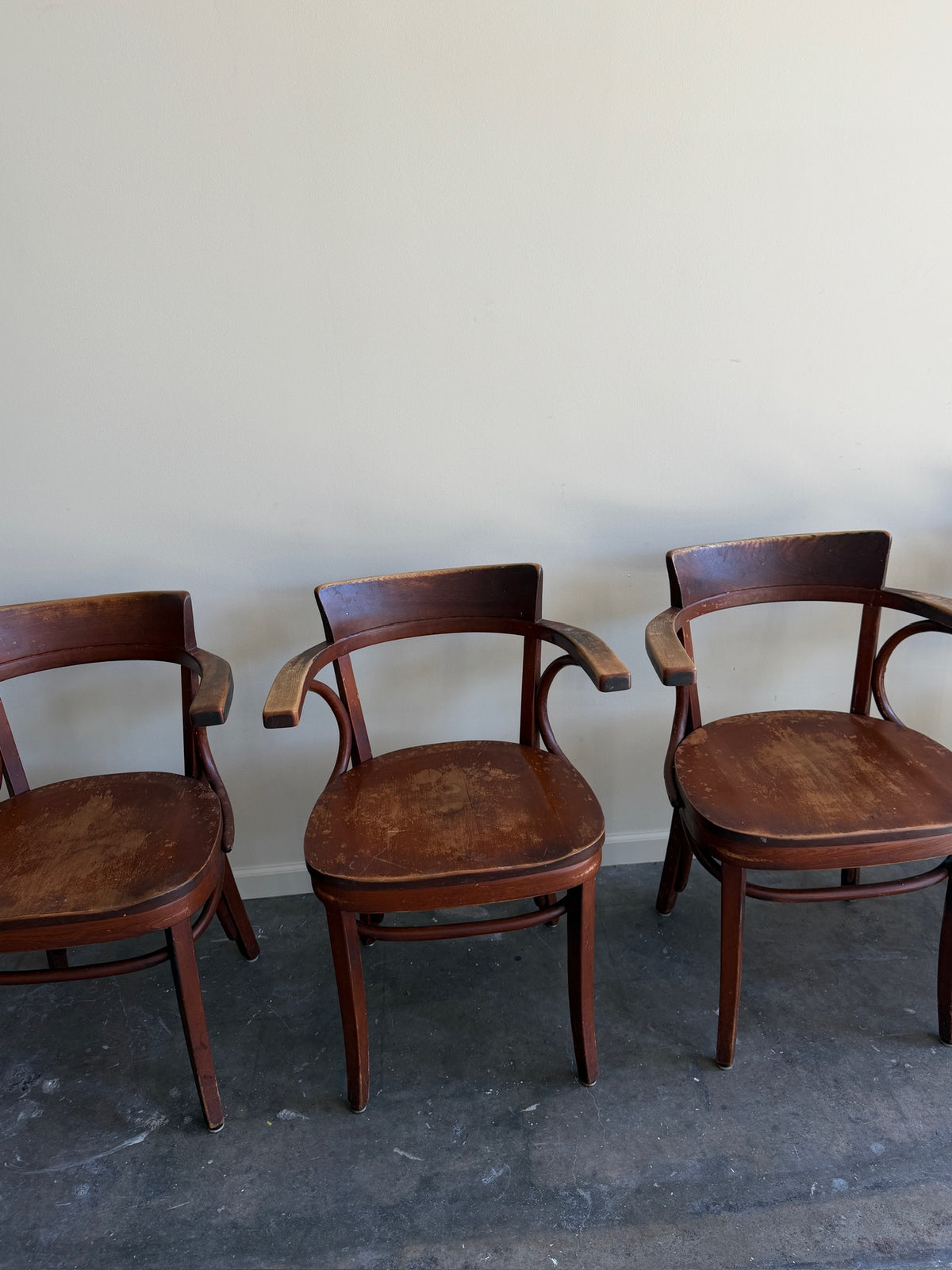 Thonet bentwood arm chairs. Sold in pairs.
