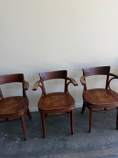 Thonet bentwood arm chairs. Sold in pairs.