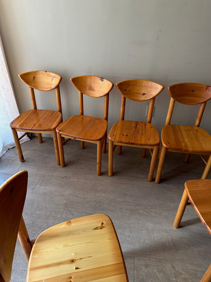 Rainer Daumiller pine cat-eye dining chairs. Sold in sets of 2.