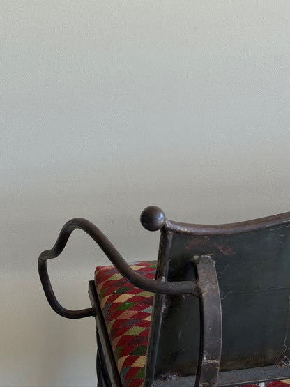 Wrought iron sculptural bench
