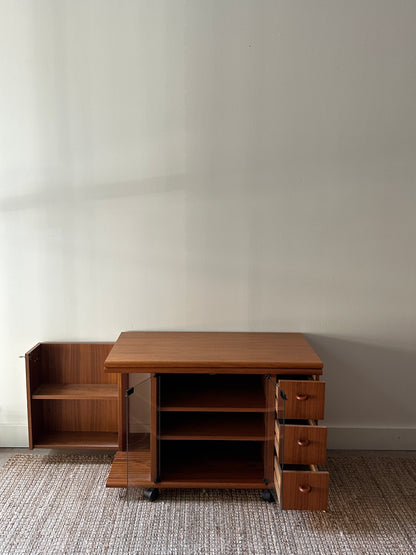 Teak swivel top media cabinet