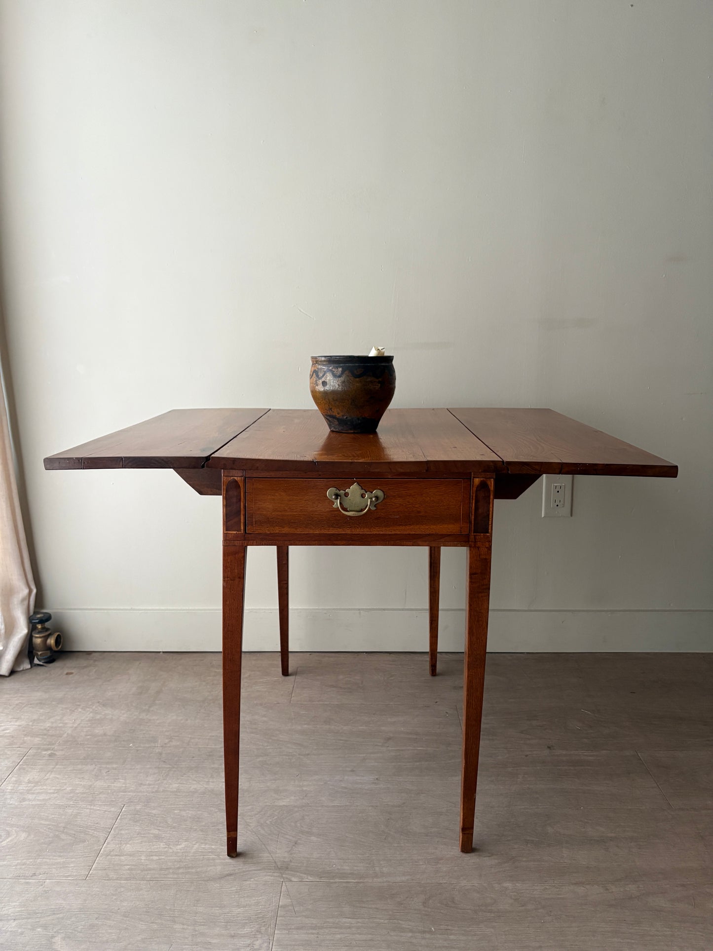 Inlaid walnut drop leaf table