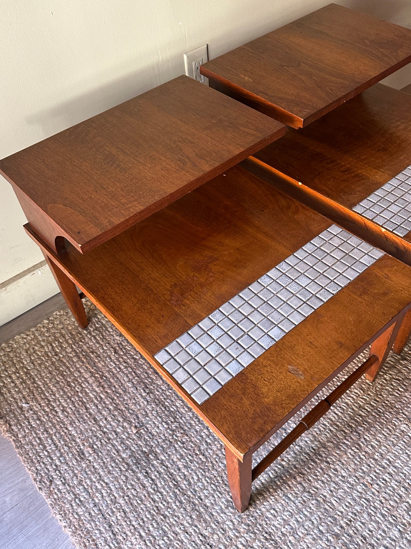 Pair of walnut and tile side tables. Sold individually
