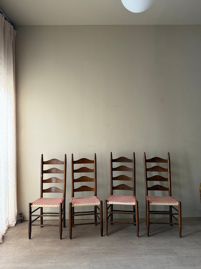 Pine ladder back chairs with woven checked seats. Sold as a set of 4.