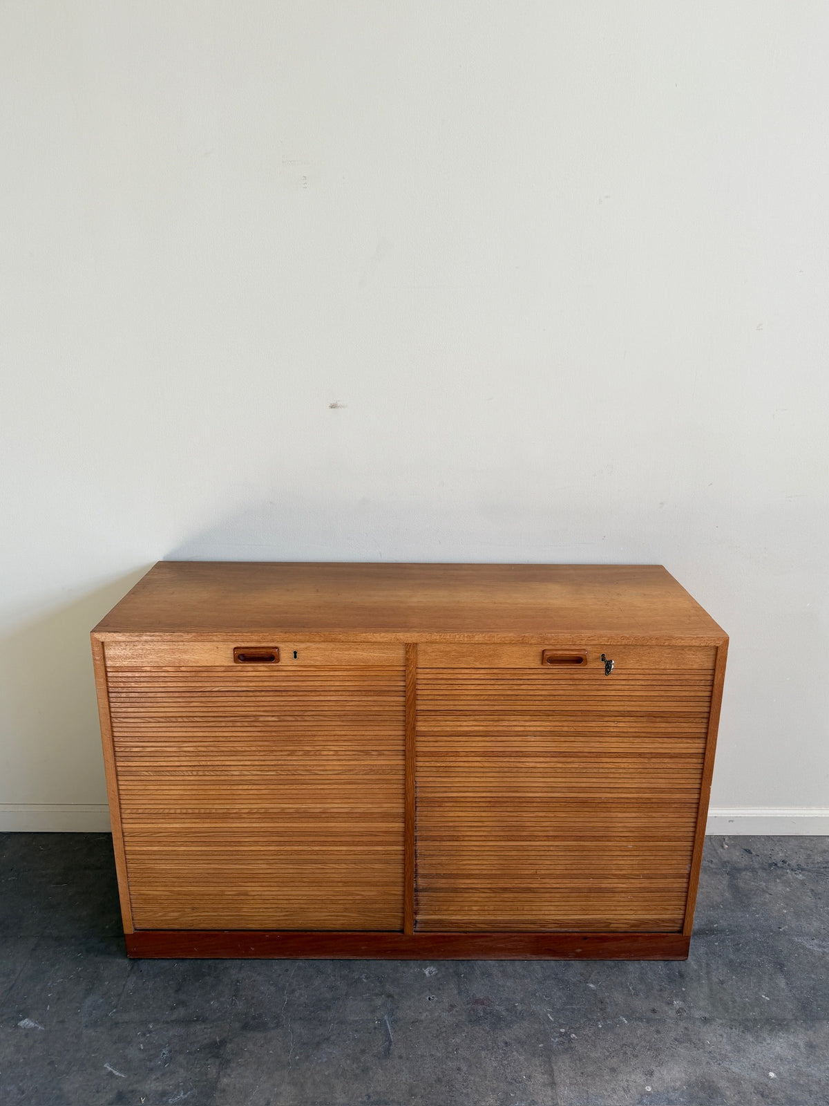 Danish oak tambour cabinet