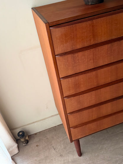 Danish teak tallboy dresser (left)