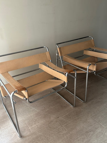 Tan Wassily chairs. Sold individually.