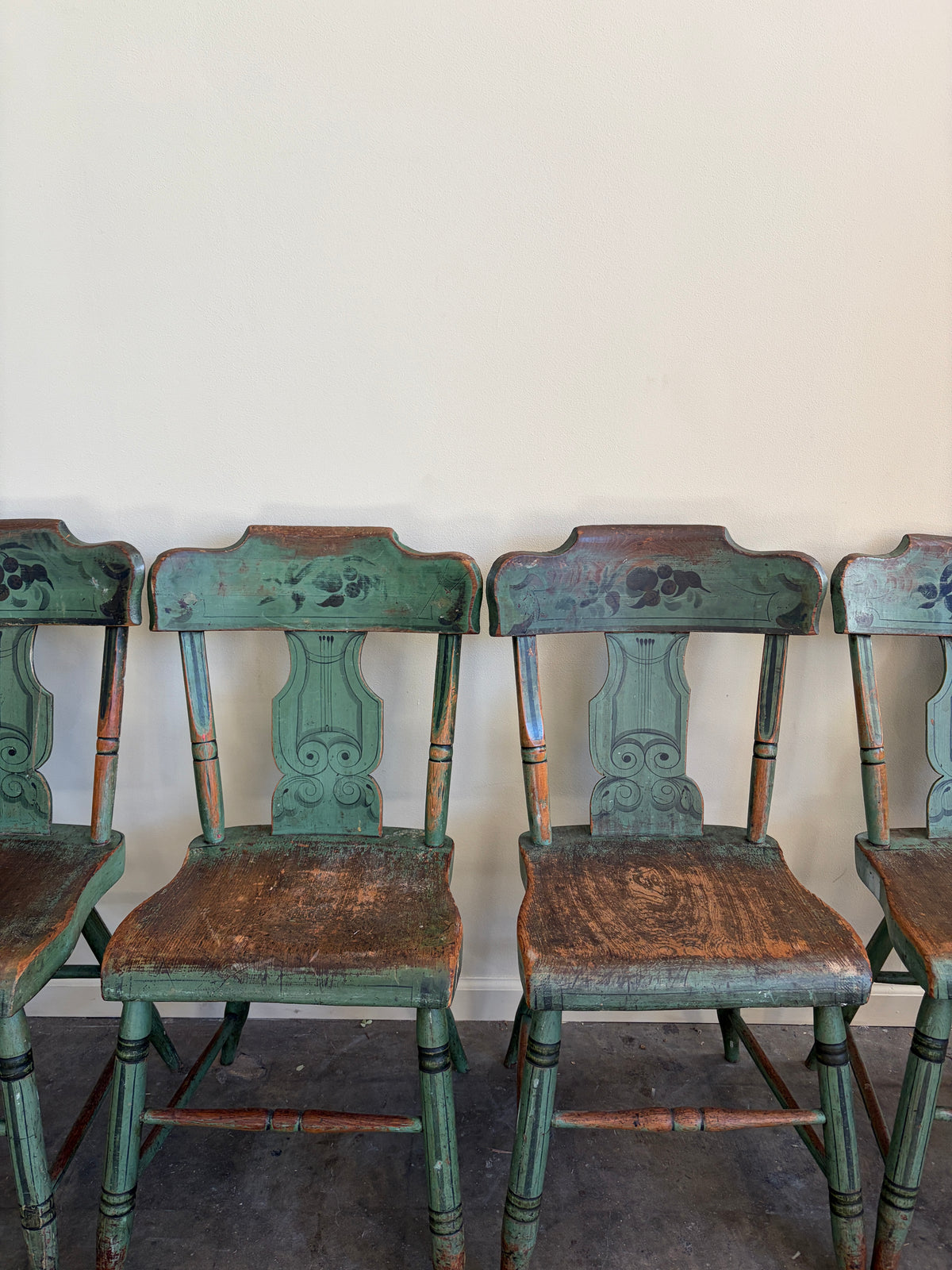 Pennsylvania Sheraton Paint-Decorated Plank Seat Chairs. Sold in pairs.