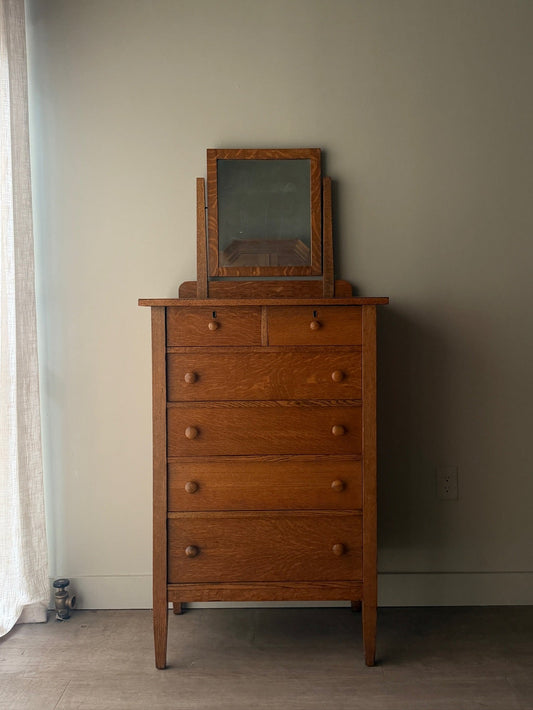 Golden oak tallboy with mirror