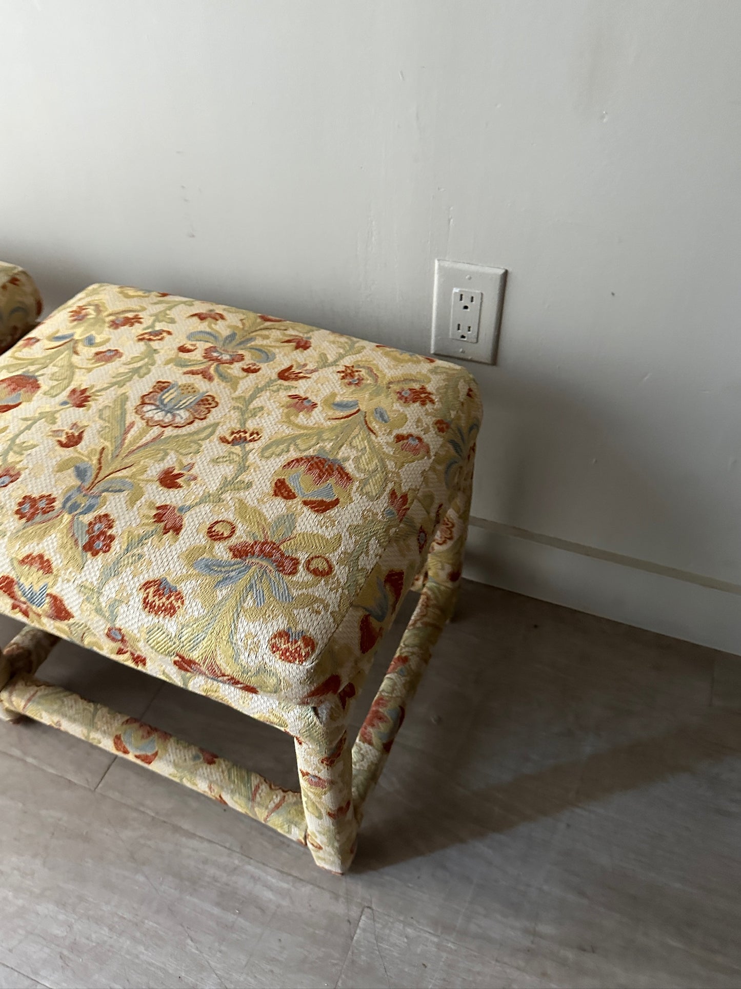 2 Milo Baughman floral upholstered stools or ottomans. Sold individually.