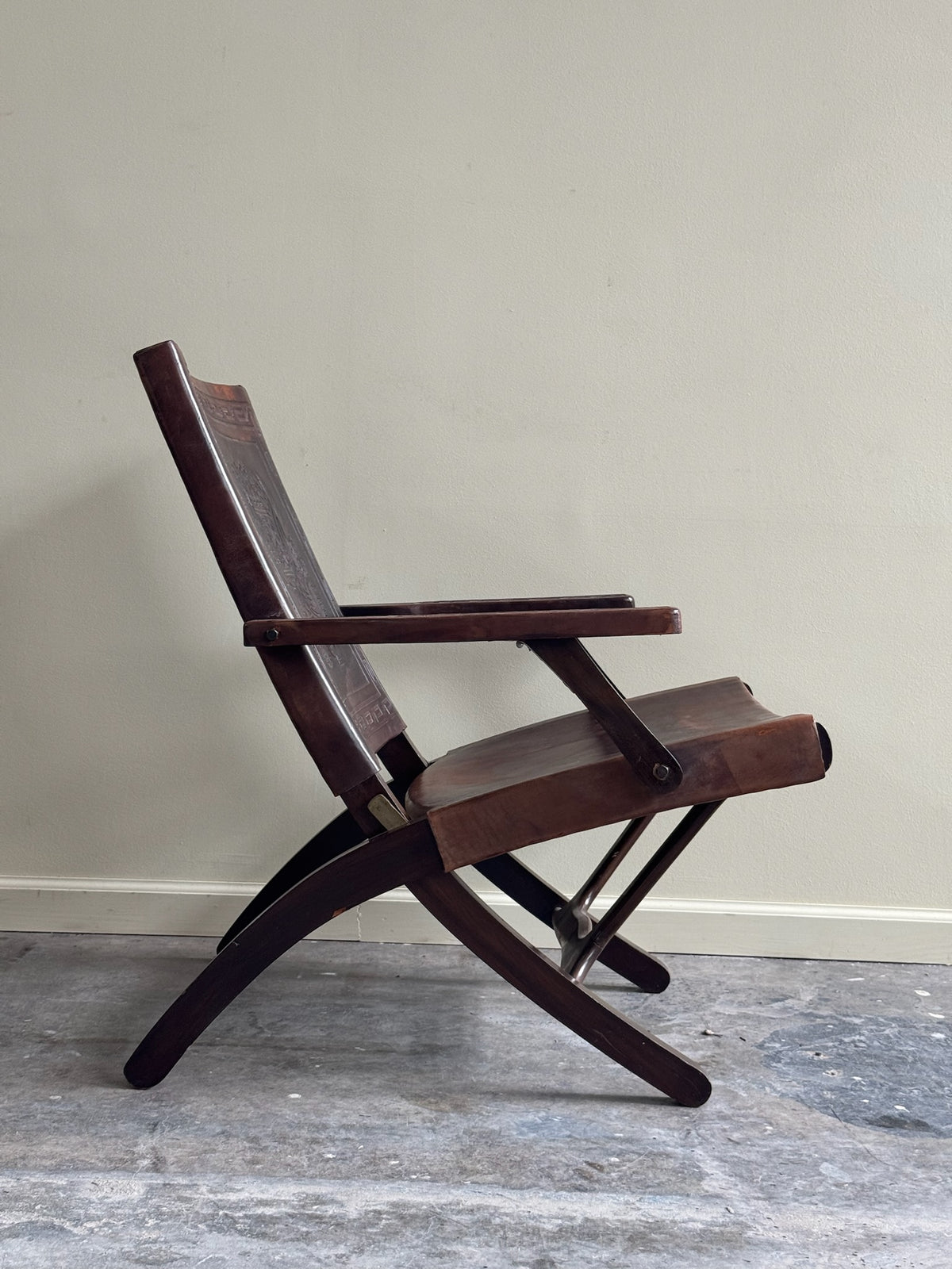 Angel Pazmino tooled leather folding lounge chair