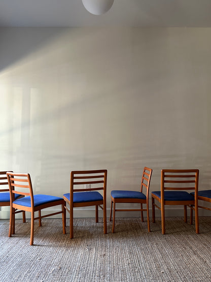 2 maple dining chairs. Sold individually.