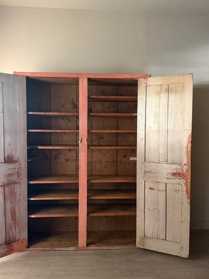 Salmon painted pine cupboard