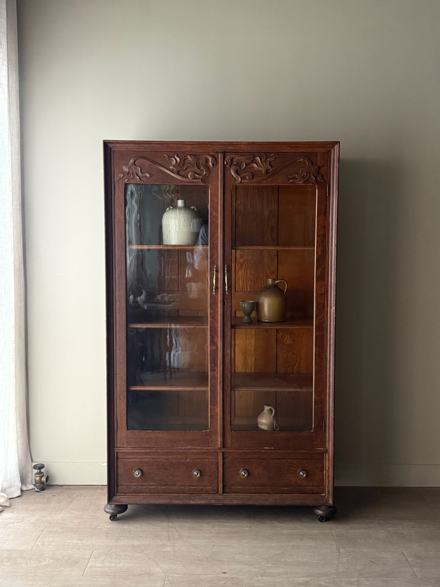 Golden oak display cabinet
