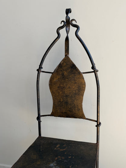 Wrought iron sculptural chairs (right)