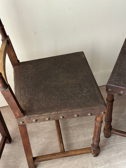 Embossed leather chairs. Sets of 2.