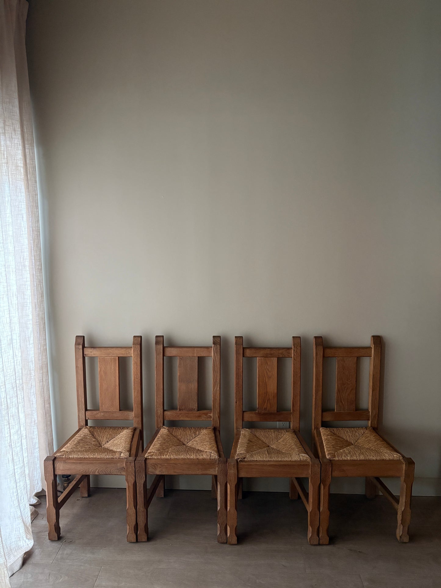 Belgian De Puydt oak & rush dining chairs. Sold in pairs.