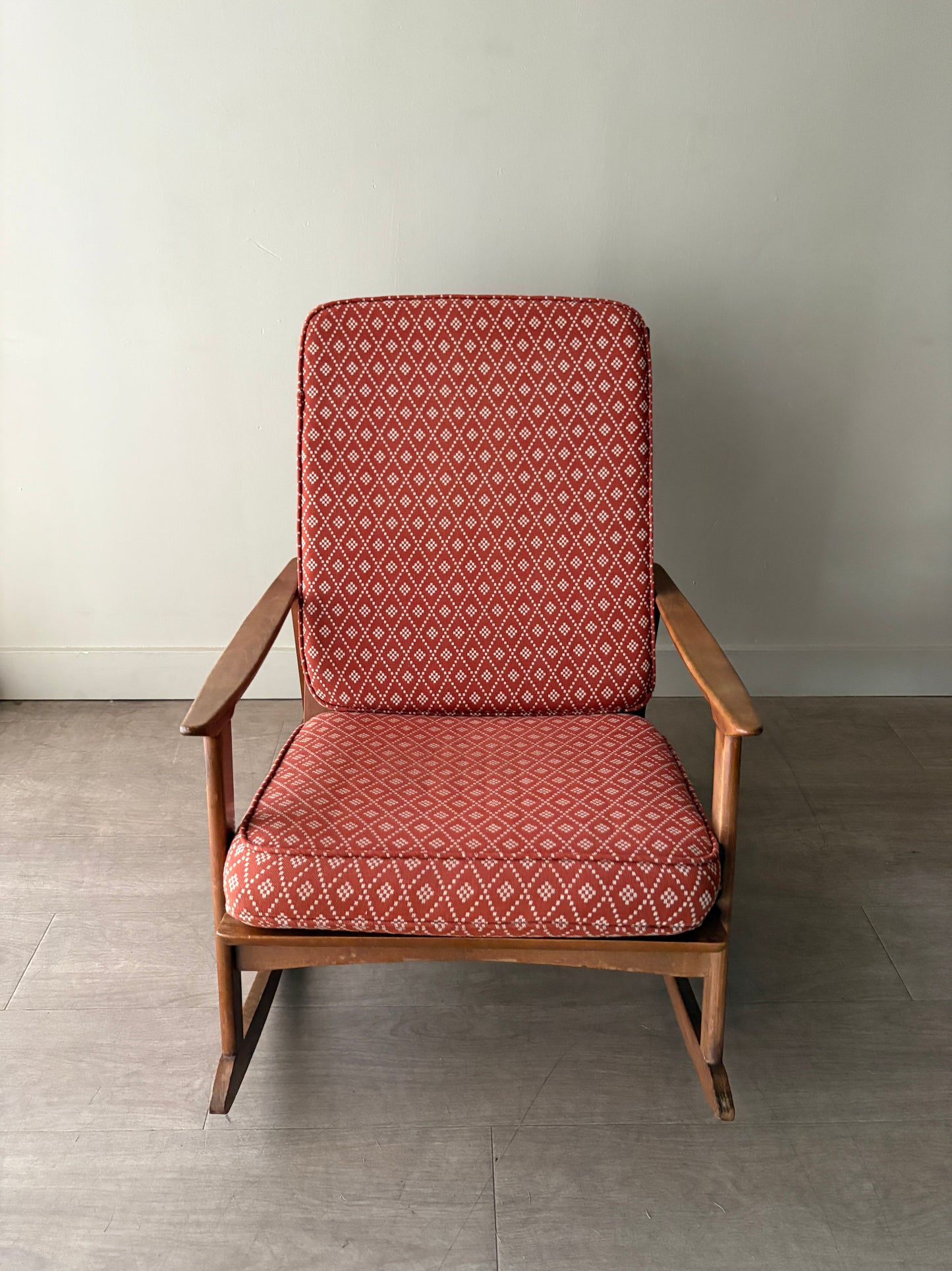 Walnut upholstered rocking chair