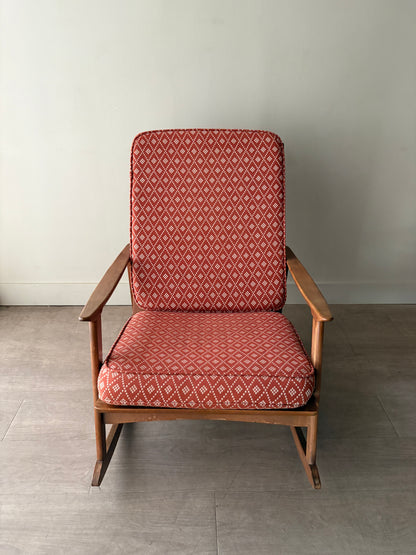 Walnut upholstered rocking chair