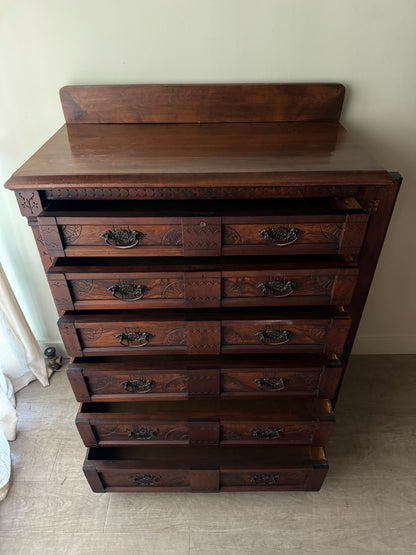 Carved Eastlake walnut dresser with side lock