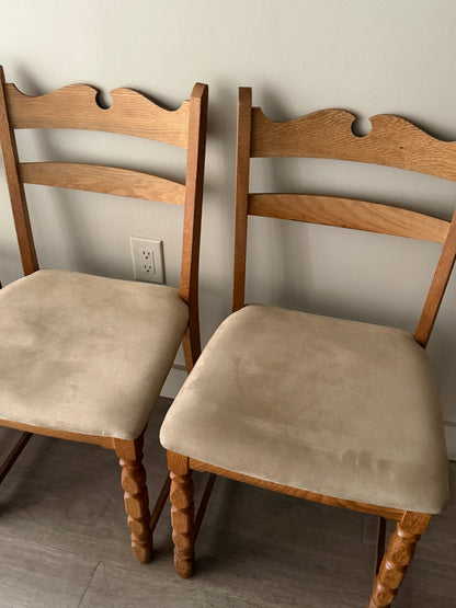 Danish oak dining chairs with suede upholstery. Sold in pairs.
