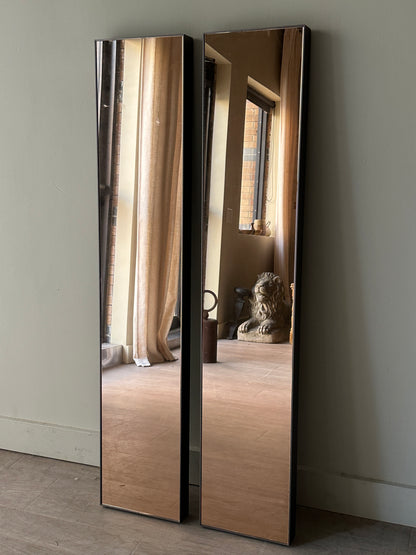 Pair of copper tinted wall mirrors. Sold together.