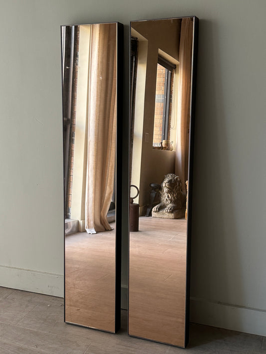 Pair of copper tinted wall mirrors. Sold together.