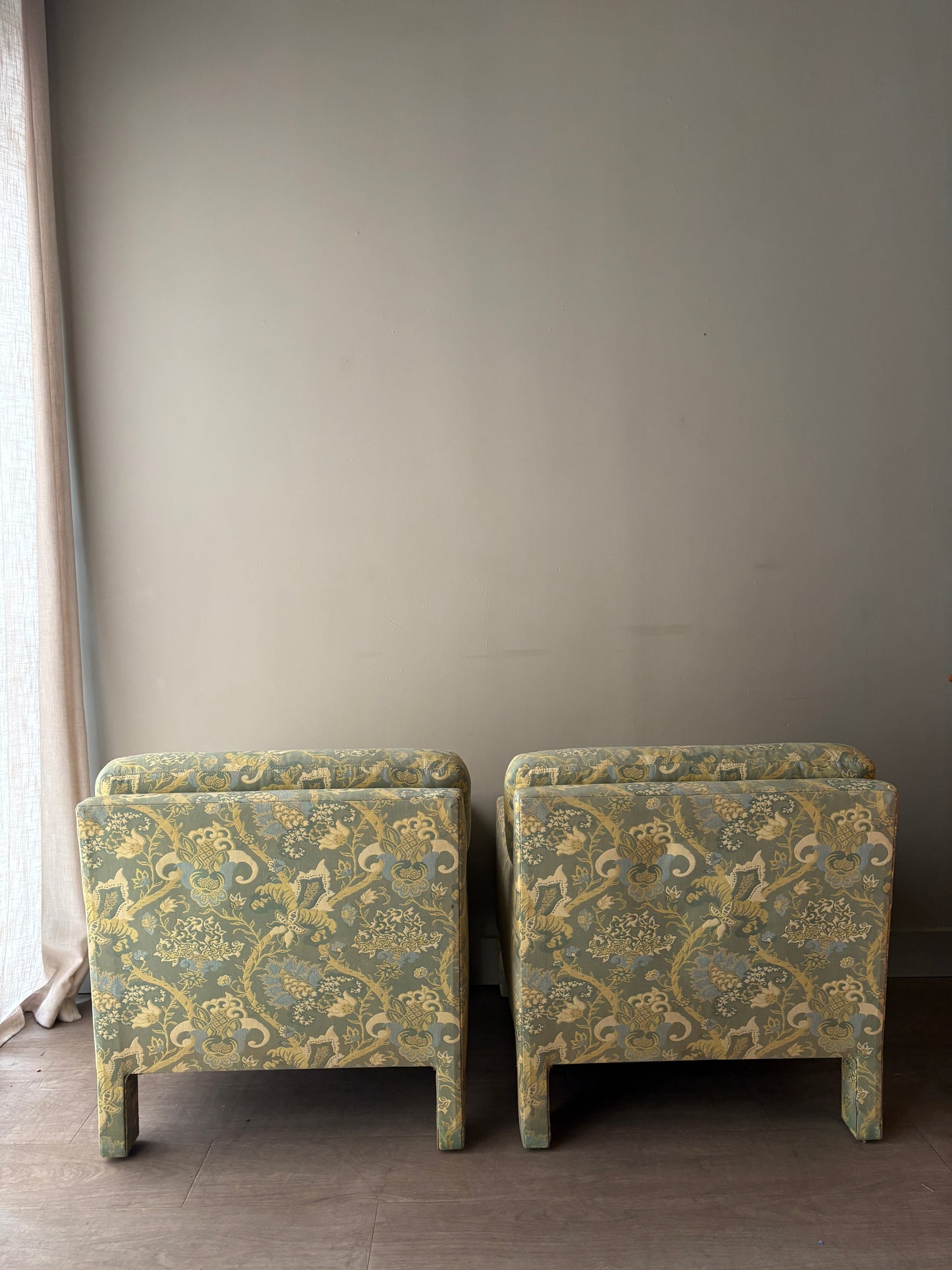 Directional green floral upholstered lounge chairs. Sold individually.