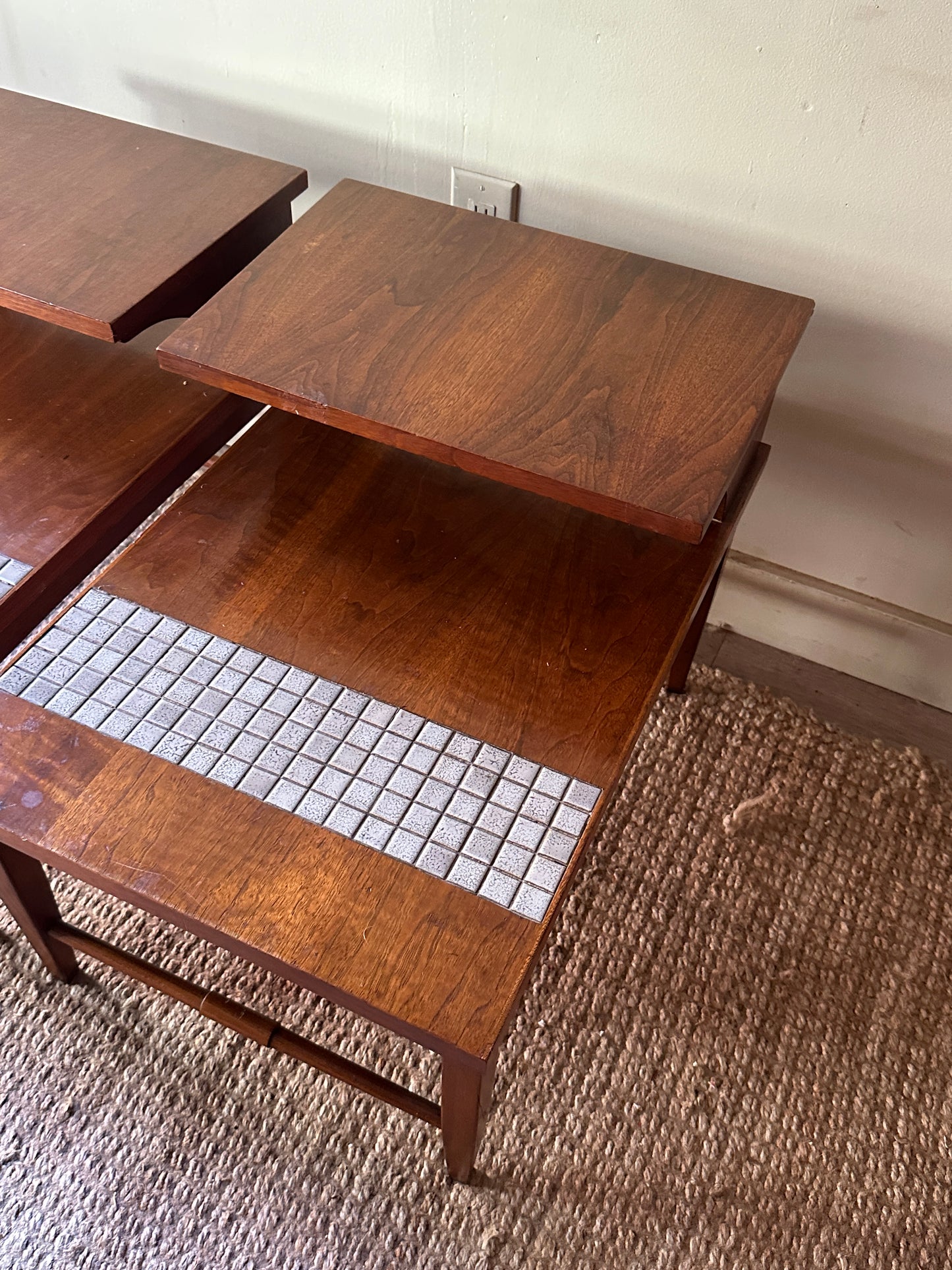 Pair of walnut and tile side tables. Sold individually