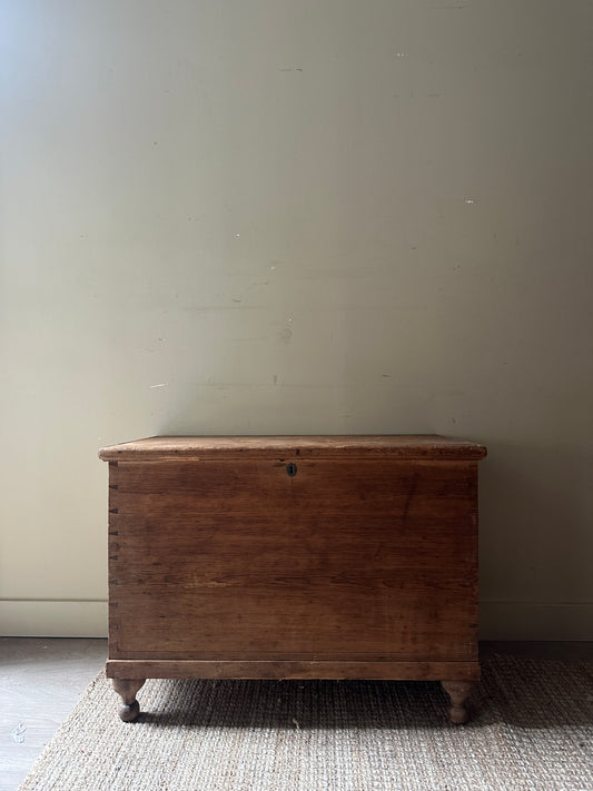 Light pine ball foot chest