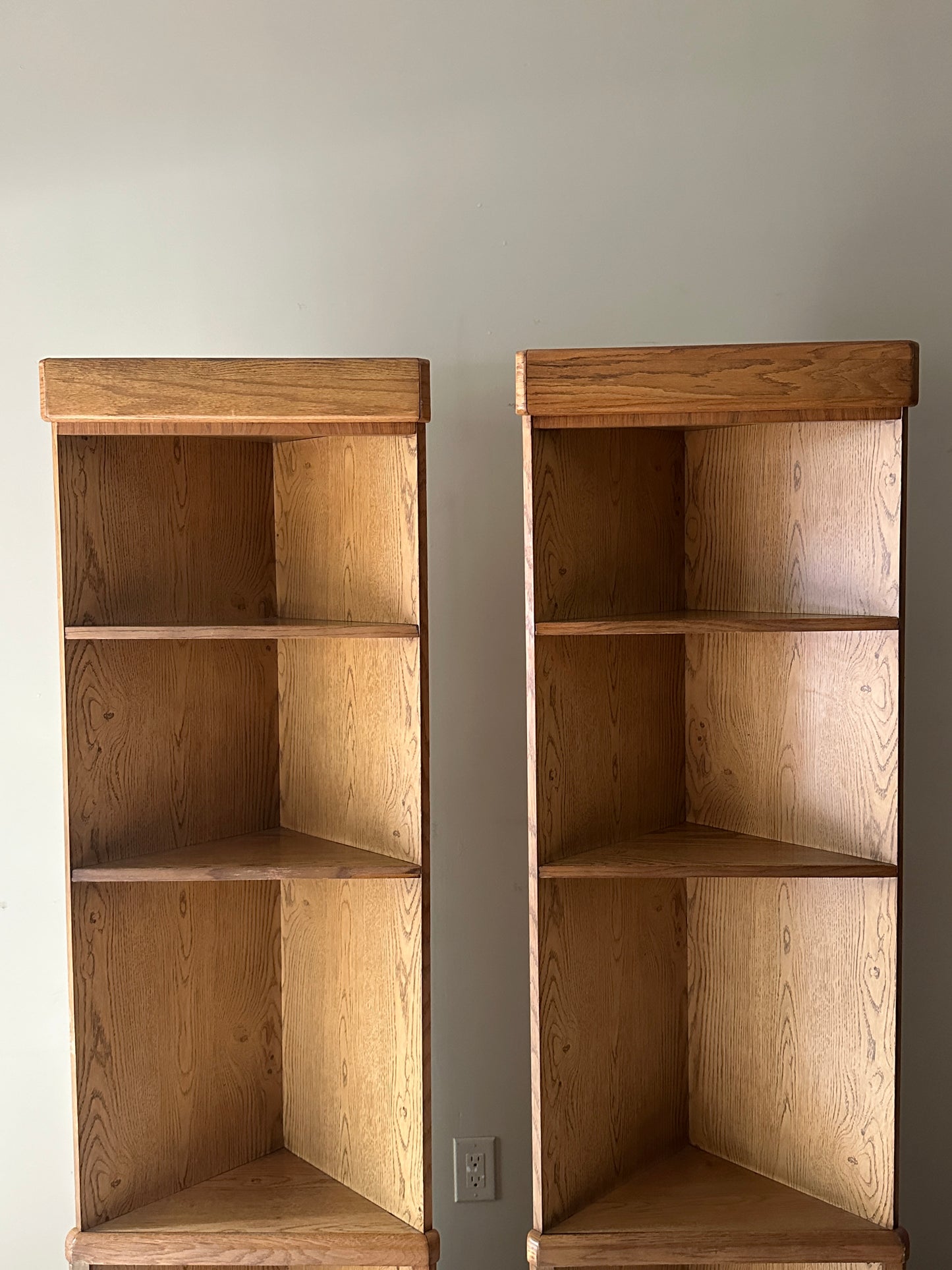 Laminate oak corner shelves. Sold individually.