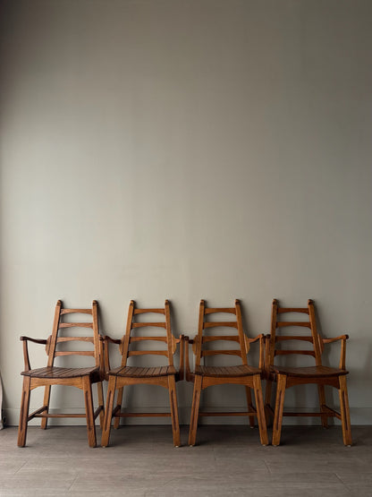 Scandinavian oak dining chairs. Sold in pairs.