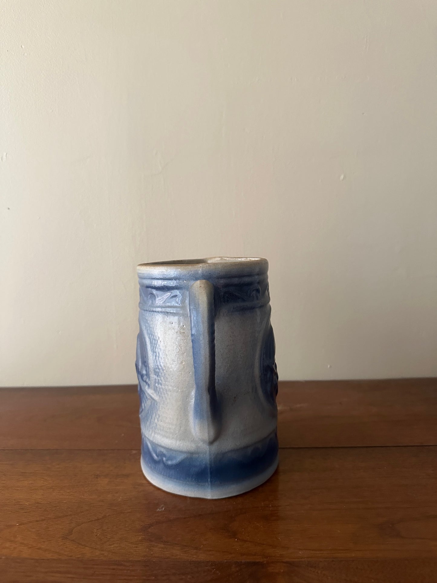 Salt glazed stoneware pitcher with birds