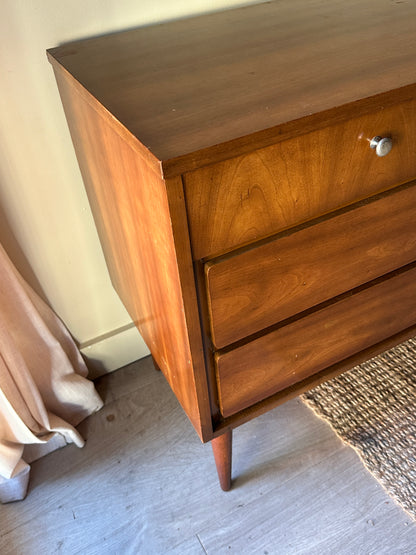 Walnut nine drawer, chrome knob dresser