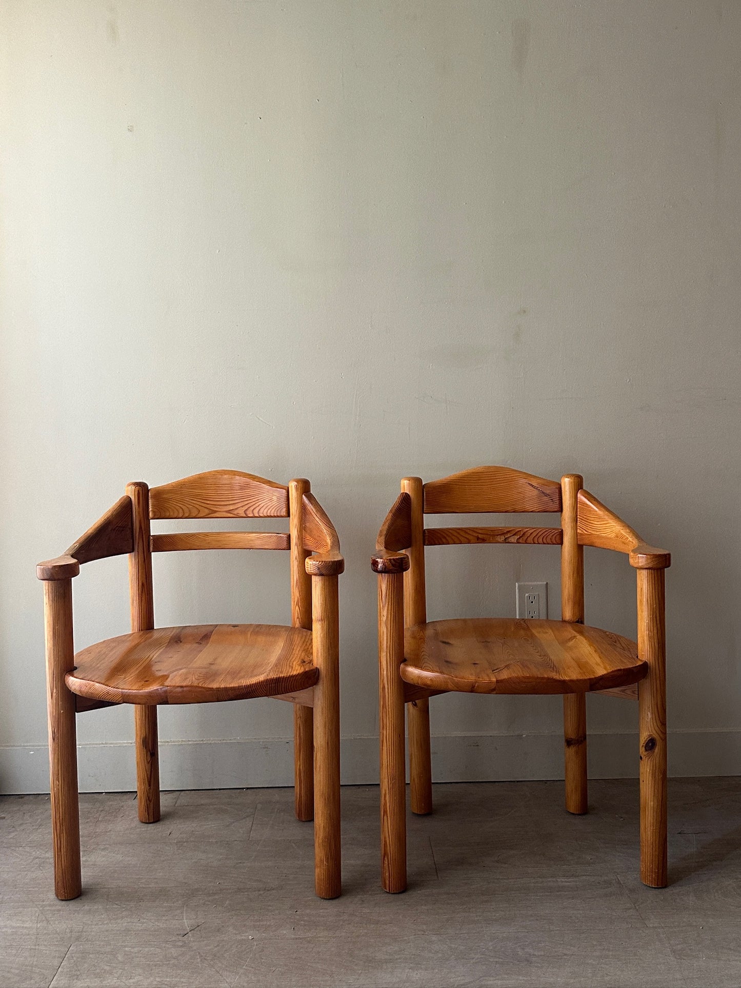 Rainer Daumiller pine dining chairs with arms. Sold as set of 2.