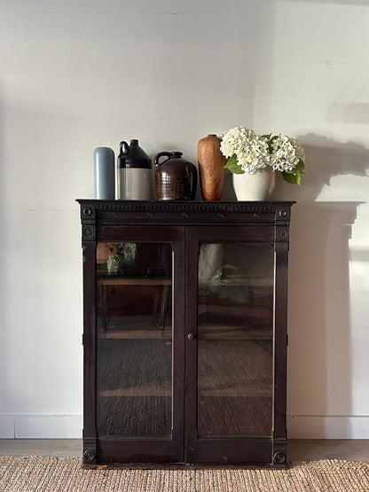 Carved mahogany display case