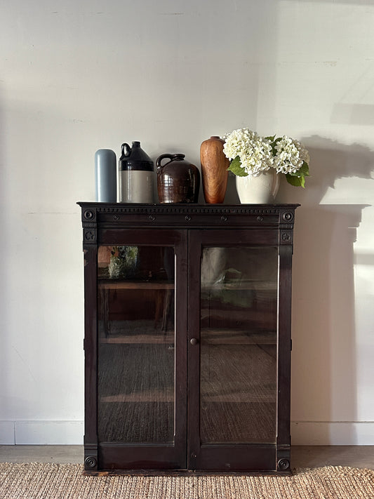 Carved mahogany display case