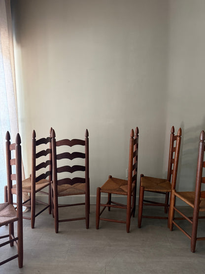 Cherry ladder back rush seat dining chairs. Sold in pairs.