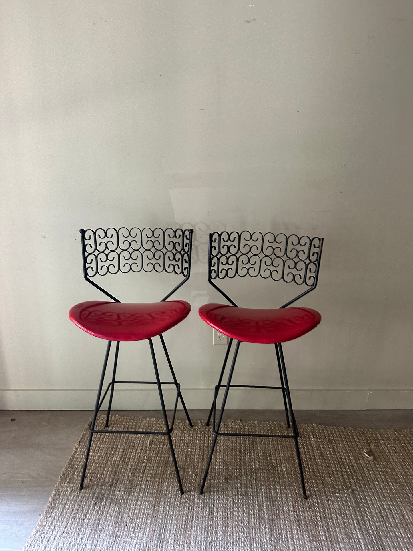 Umanoff bar stools. Sold as a pair.