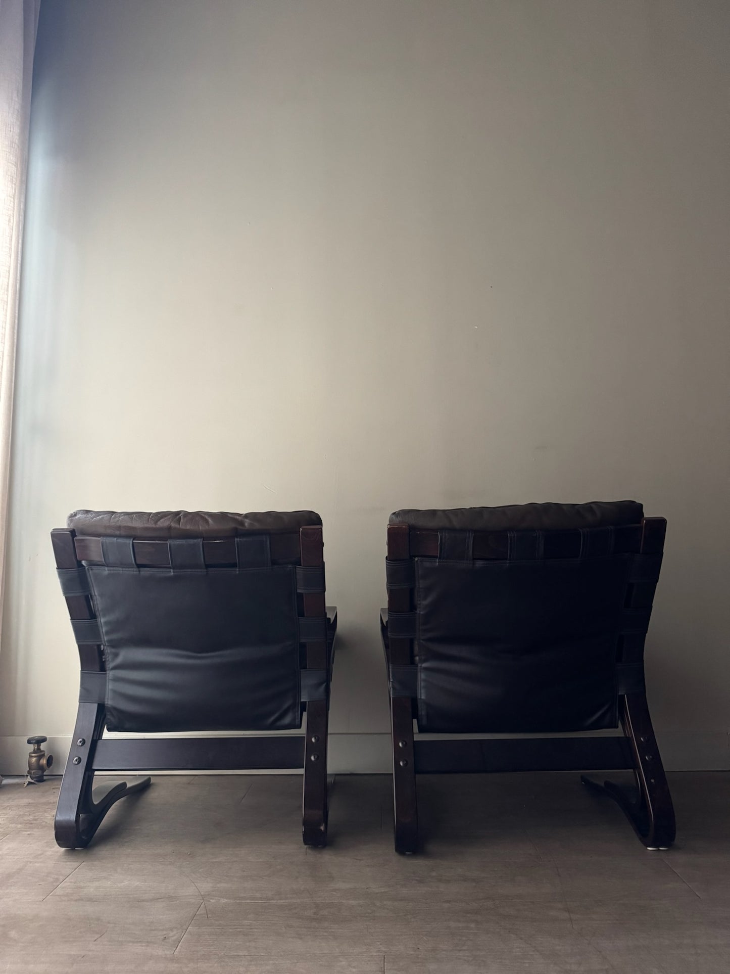 Einar Hove Norwegian brown leather lounge chairs. Sold individually.
