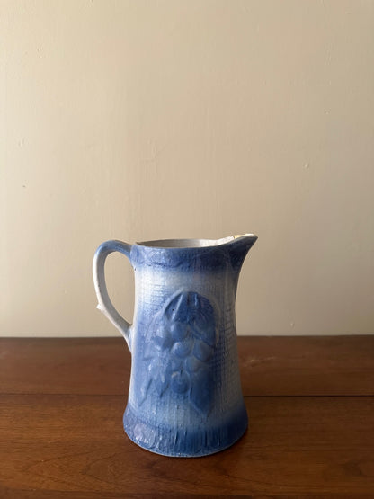 Salt glazed stoneware pitcher with fruit
