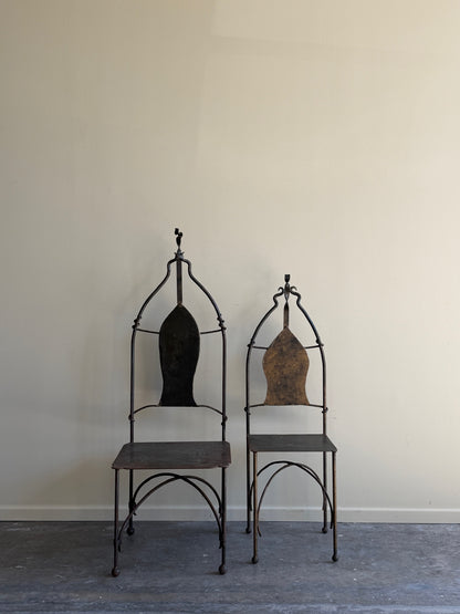 Wrought iron sculptural chairs (right)