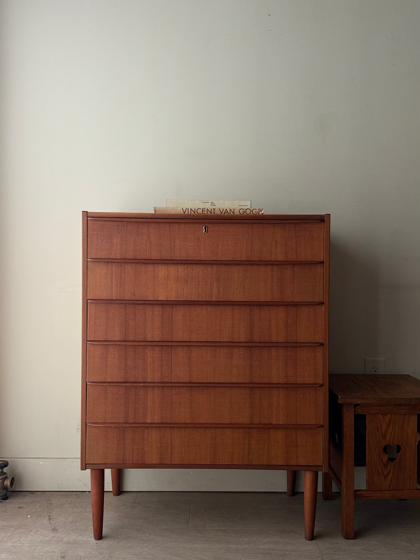 Danish teak tallboy dresser (right)