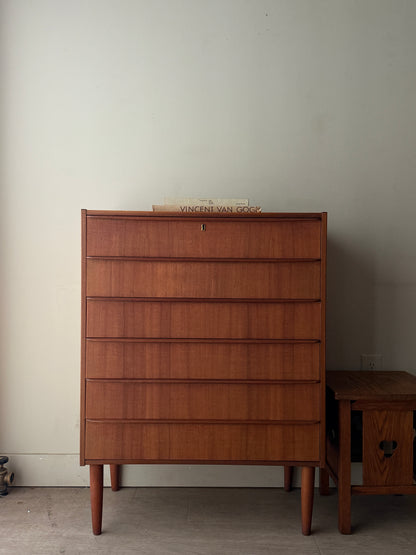 Danish teak tallboy dresser (right)