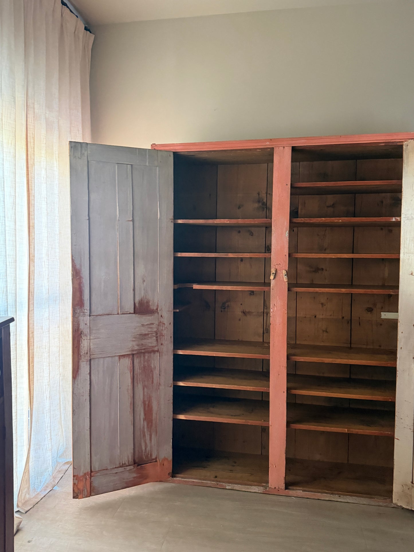 Salmon painted pine cupboard