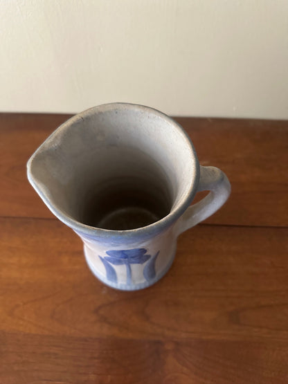 Salt glazed stoneware pitcher with flower
