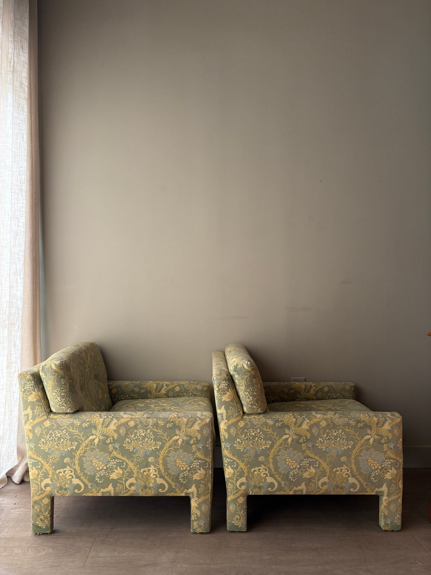 Directional green floral upholstered lounge chairs. Sold individually.