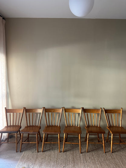 6 oak dining chairs. Sold in pairs.