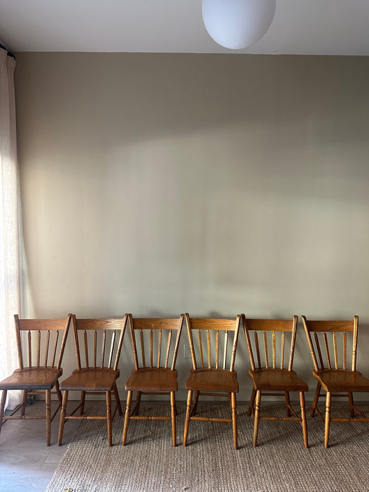 6 oak dining chairs. Sold in pairs.