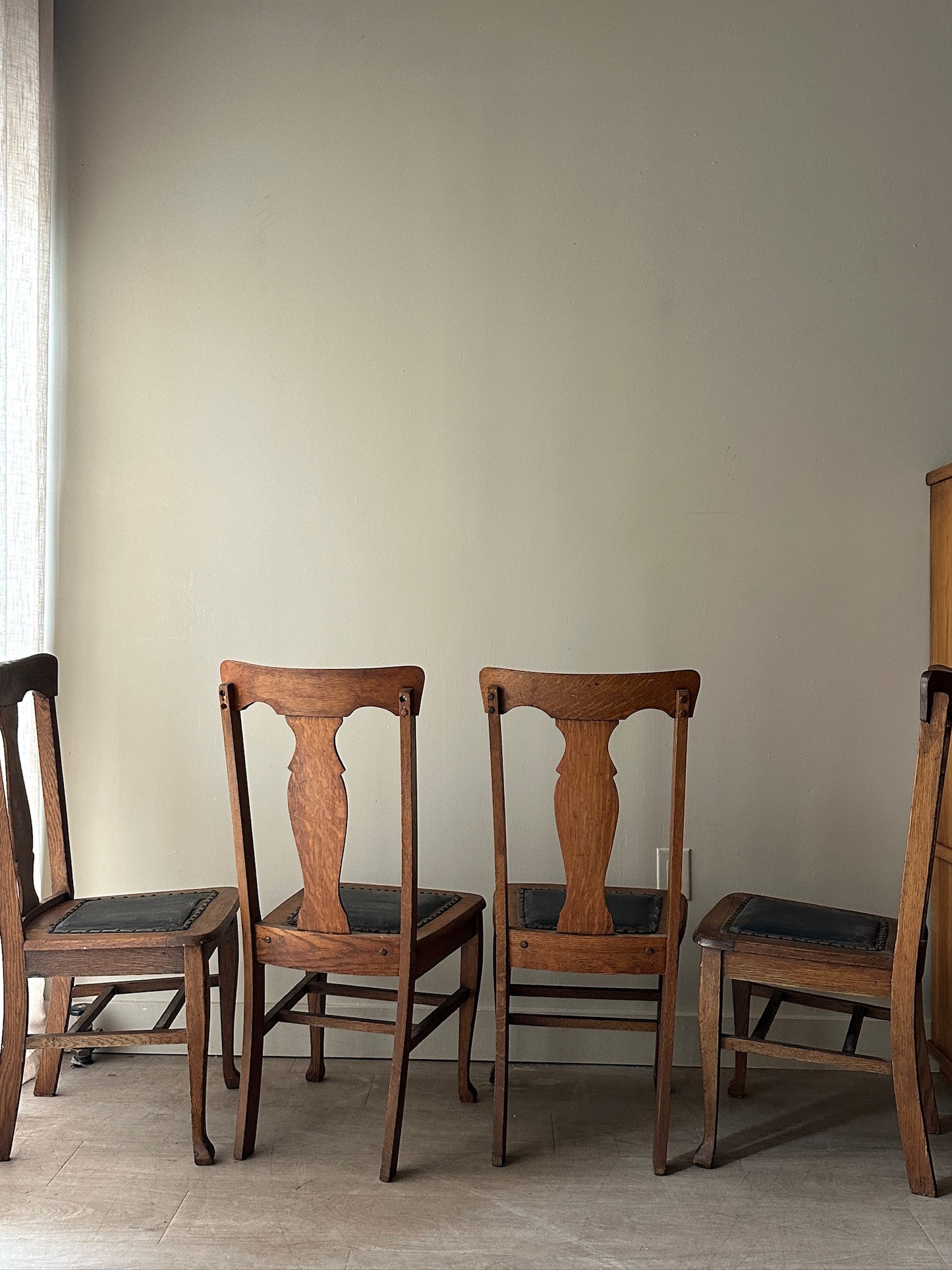 4 oak and leather dining chairs. Sets of 2.